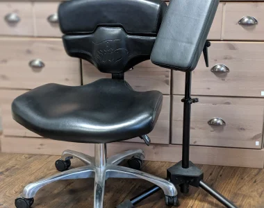 Used tattoo chair and armrest